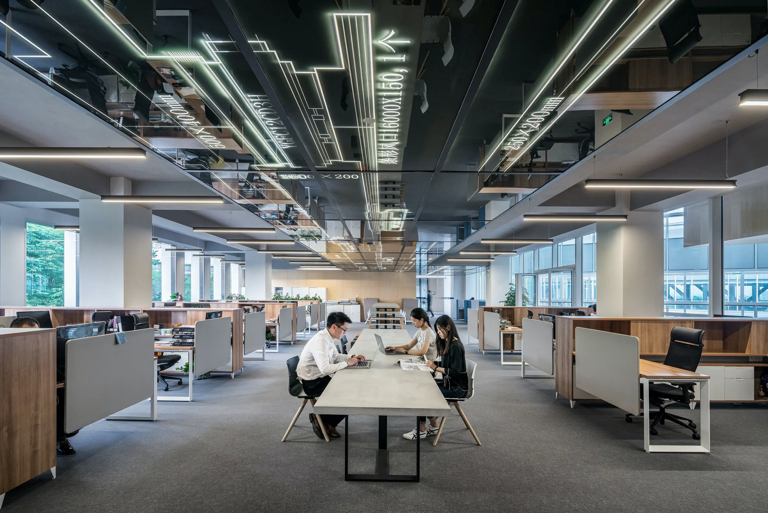 people around desk talking